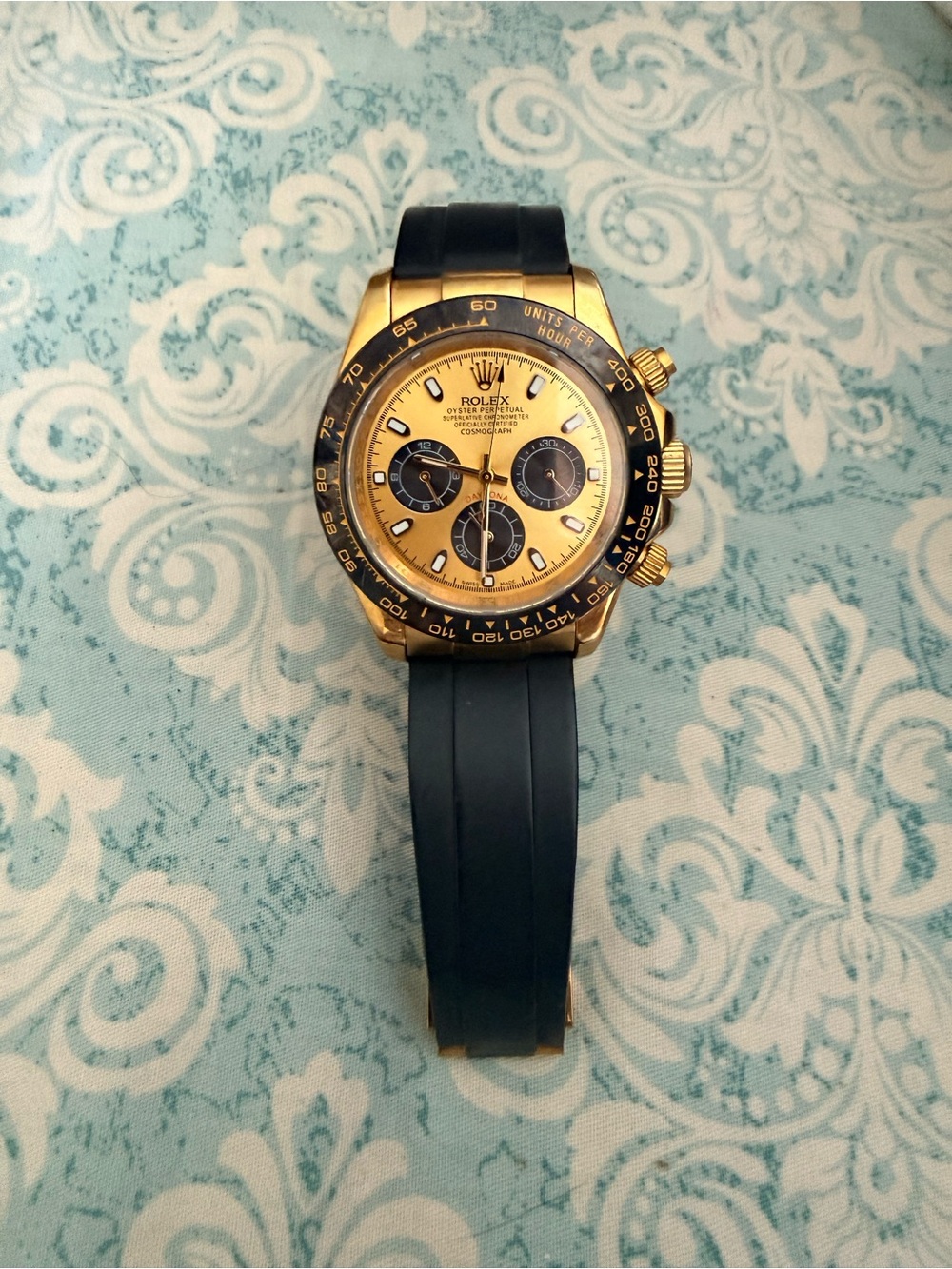 Gold Dial Watch with Black Strap and Bezel